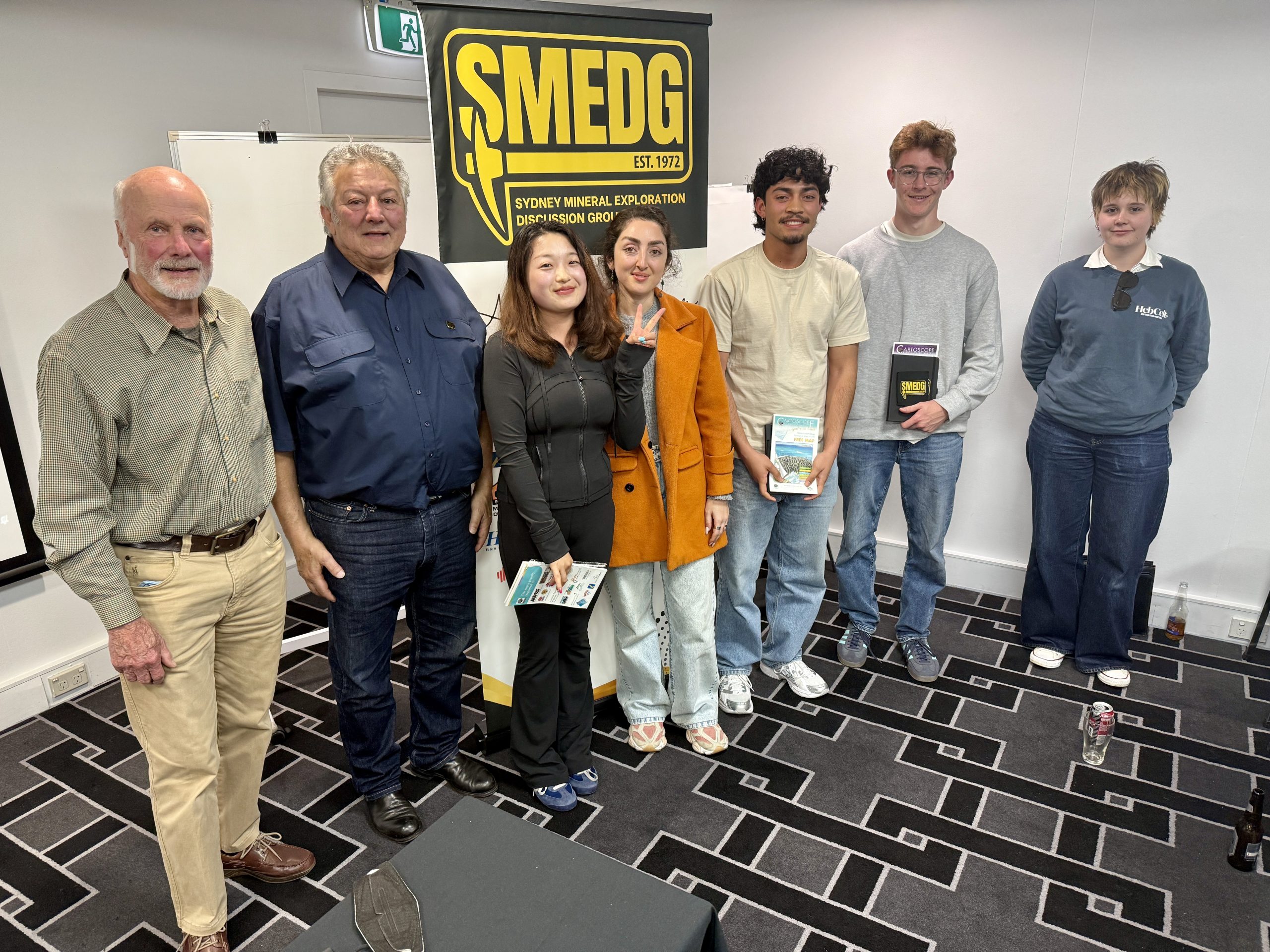 Student raffle prize-winners and SMEDG Committee members at May 2026 meeting